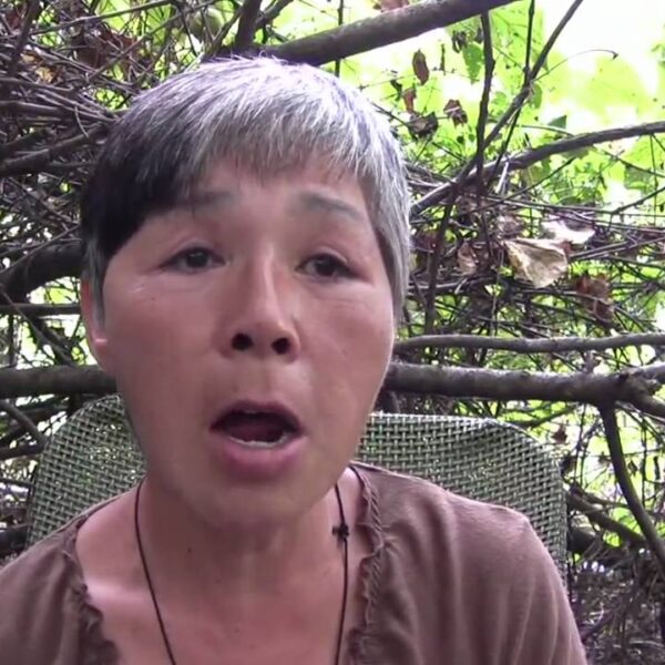 Yong lost everything in a fire. She now lives in a tent homeless