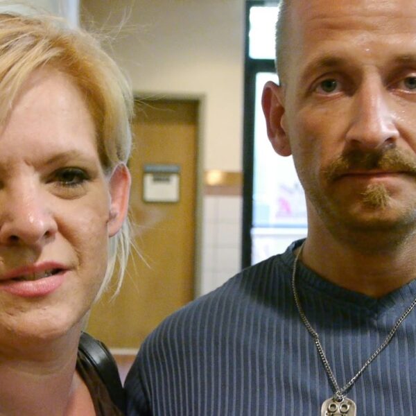 Nikki and Scott are homeless on Skid Row. Their feet are blistered from walking