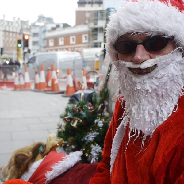 Alex has been sleeping rough in London for 9 years. He dresses up as Santa to panhandle