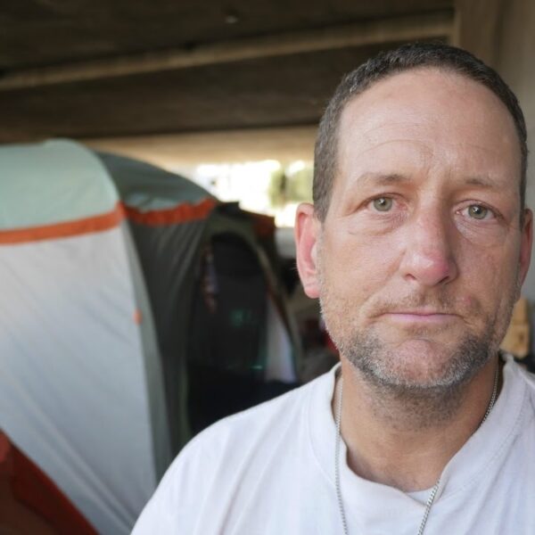 Robert lives in a tent homeless under a bridge near downtown Los Angeles