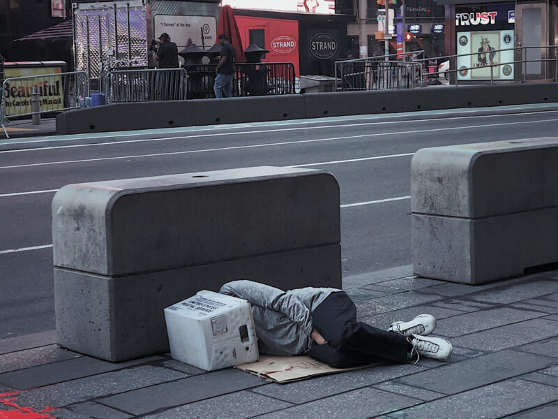 Person sleeping on street
