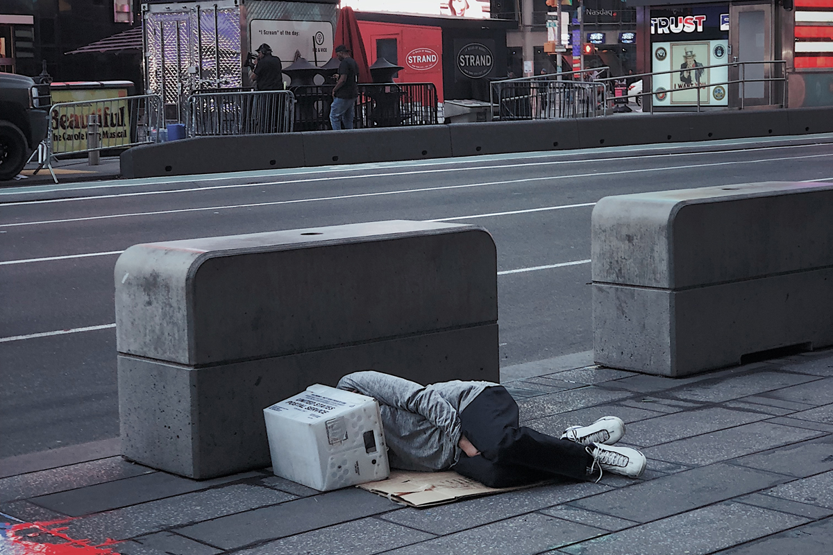 Person sleeping on street