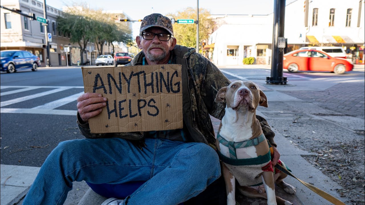 Homeless Veteran Flying A Sign In Gainesville, Florida