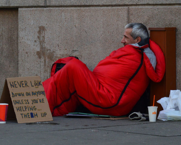 homeless man sleeping outside