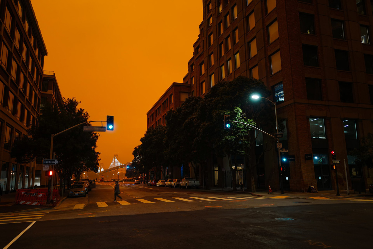 orange glow in sky from wildfires