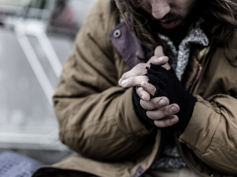 homeless man risks hypothermia in cold