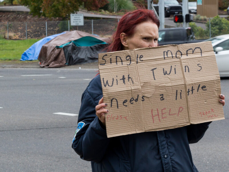 humanitarian crisis - homeless mother asks for help