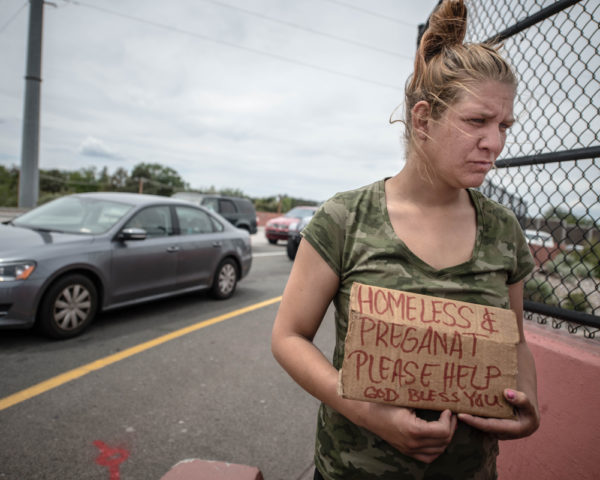 homeless pregnant woman begging for help