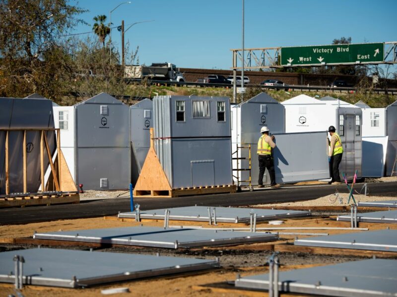 pallet shelter homes being constructed