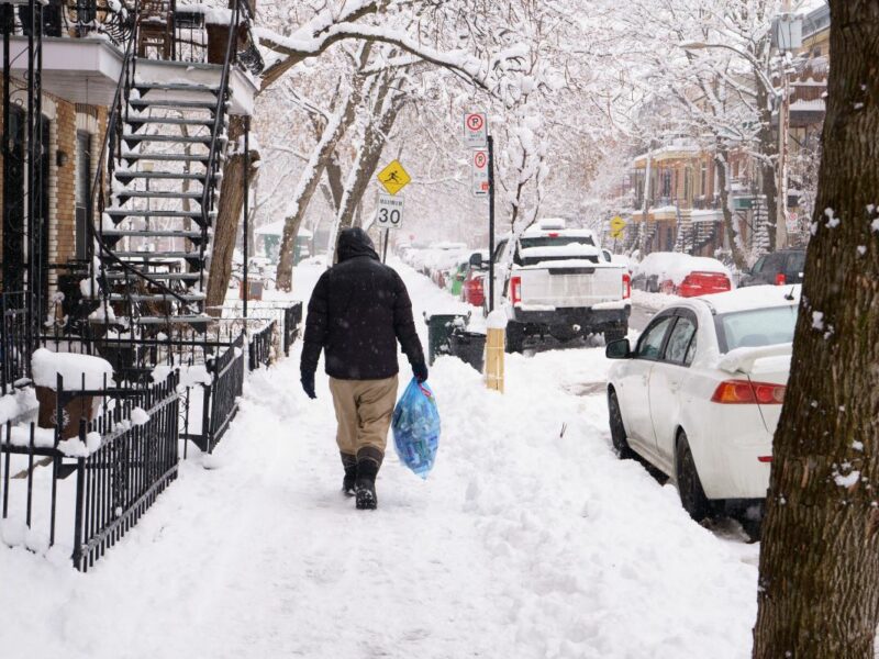 Montreal Homeless Man walking in snow