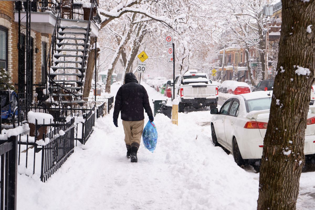 Montreal Homeless Man walking in snow