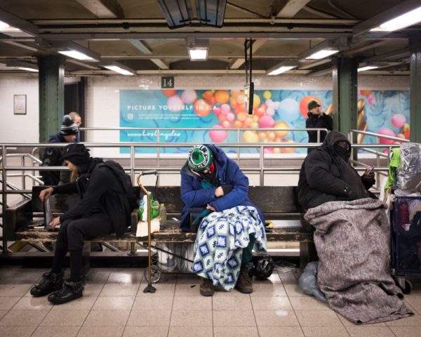 homeless people in a nyc subway station