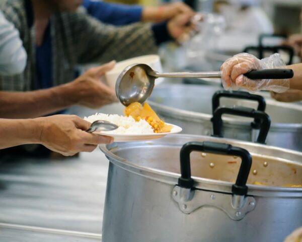 serving homeless people soup kitchen