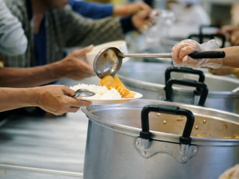 serving homeless people soup kitchen
