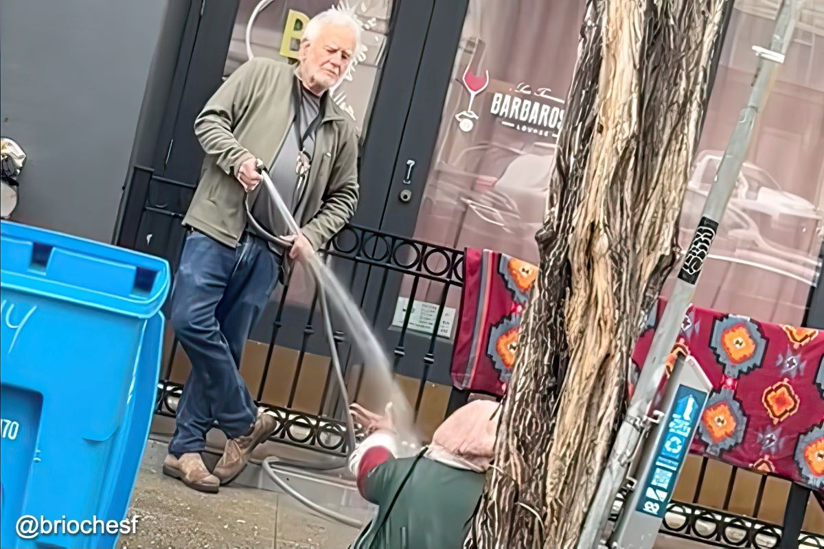 Gallery owner hosing down homeless woman