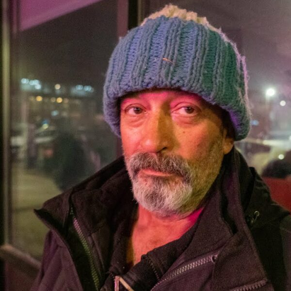 Homeless man, in Manchester, New Hampshire, freezing from the cold weather