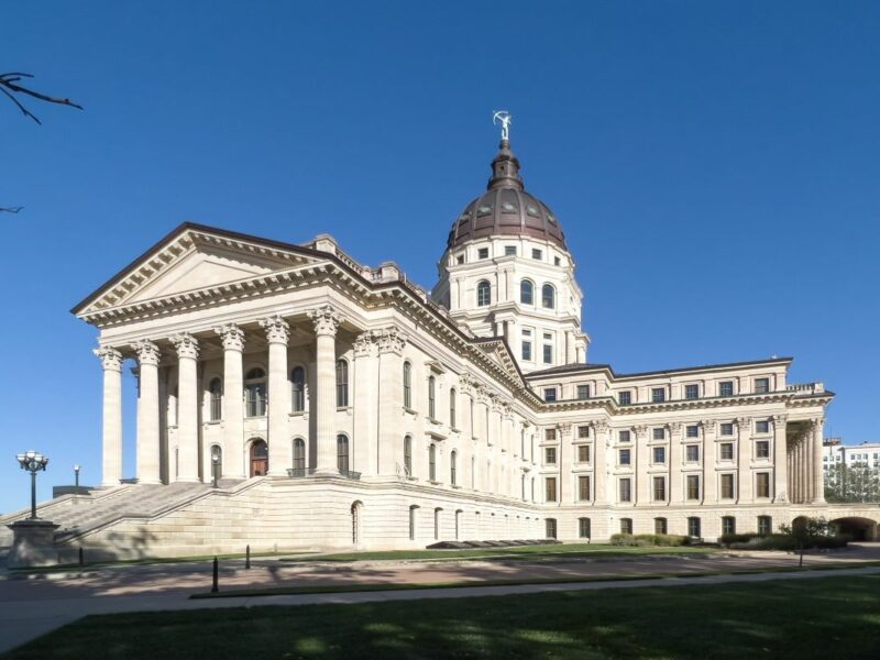 Kansas State Capitol Building where legislators are considering funding for homelessness tied to camping bans