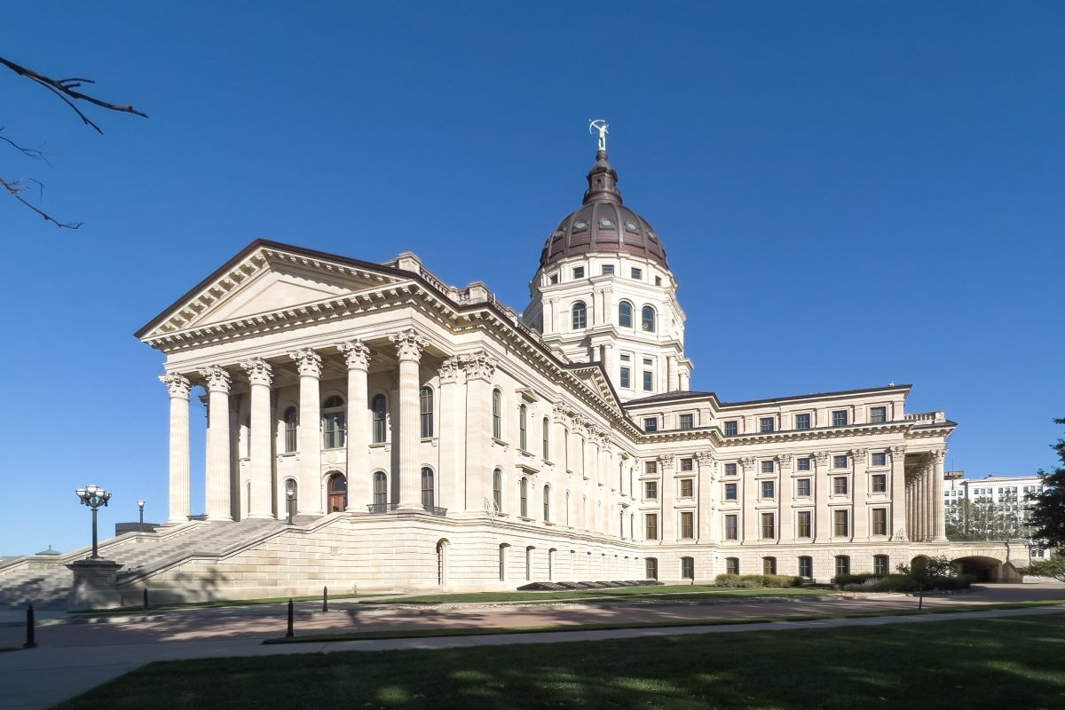 Kansas State Capitol Building where legislators are considering funding for homelessness tied to camping bans